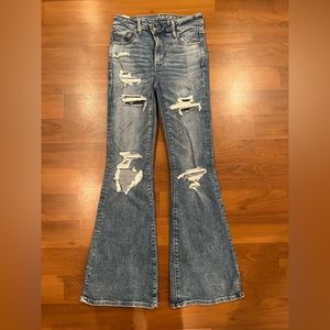 American Eagle Next Level Super High Waisted Ripped flare Jeans size 6L